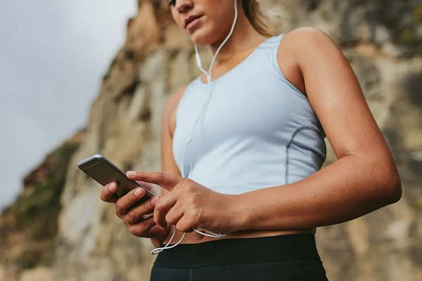 A Relação entre Esporte e Música: O Impacto da Trilha Sonora no Desempenho